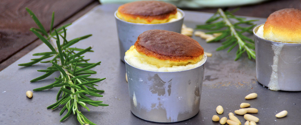 Taleggio PDO soufflé with chestnut flour and pine nut and rosemary sauce 