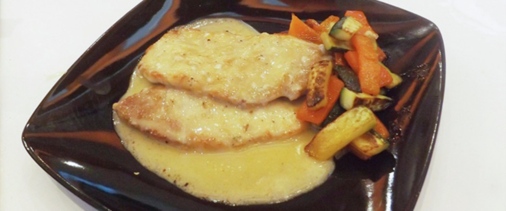 Scaloppine di maiale con crema al Taleggio D.O.P. e zucchine tornite al salto