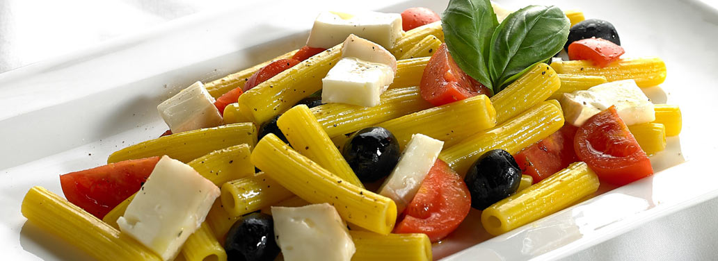 Pasta fredda allo zafferano con Taleggio D.O.P. pomodorino olive nere e basilico